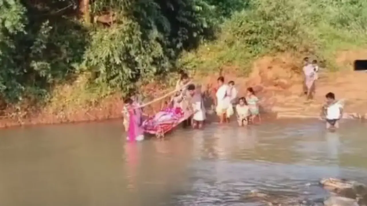 No road, elderly woman carried on cot for 3km to ambulance in Odisha's Kalahandi