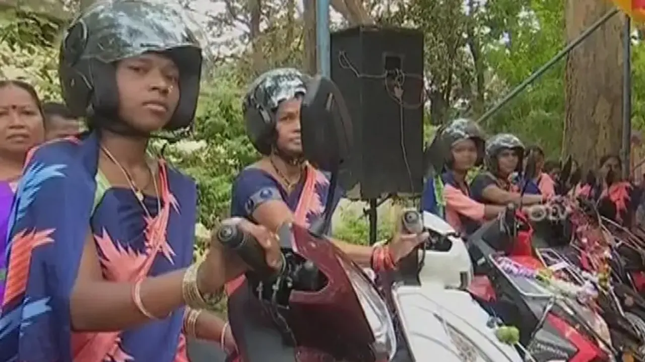 Beneficiaries with petrol scooters 
