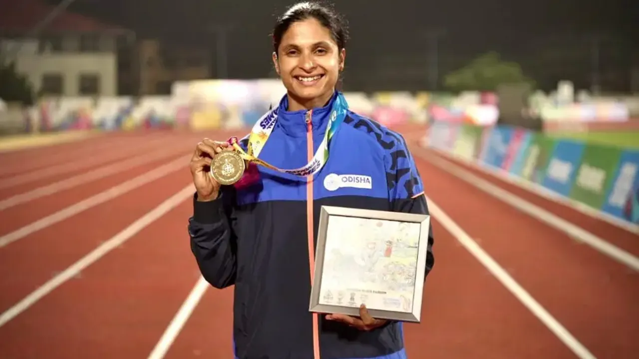 Srabani Nanda poses with her gold medal