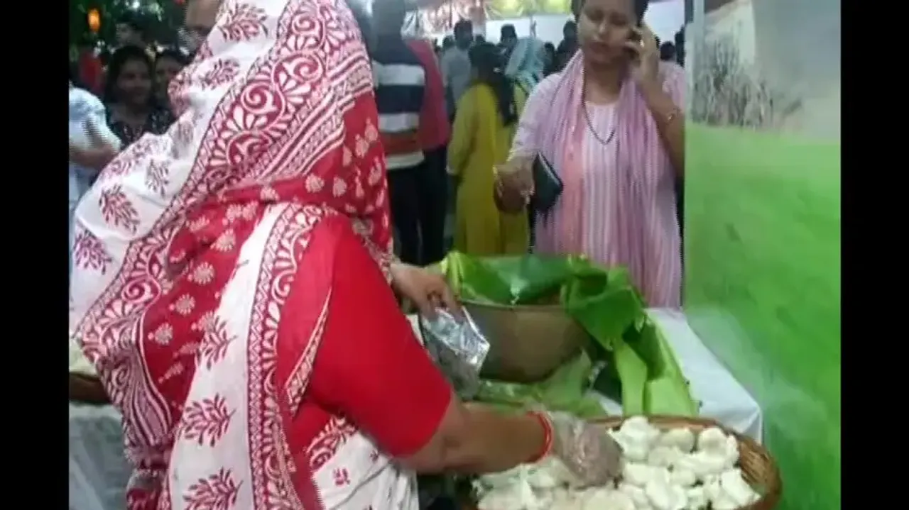 Women Sell Pitha In Bali Yatra