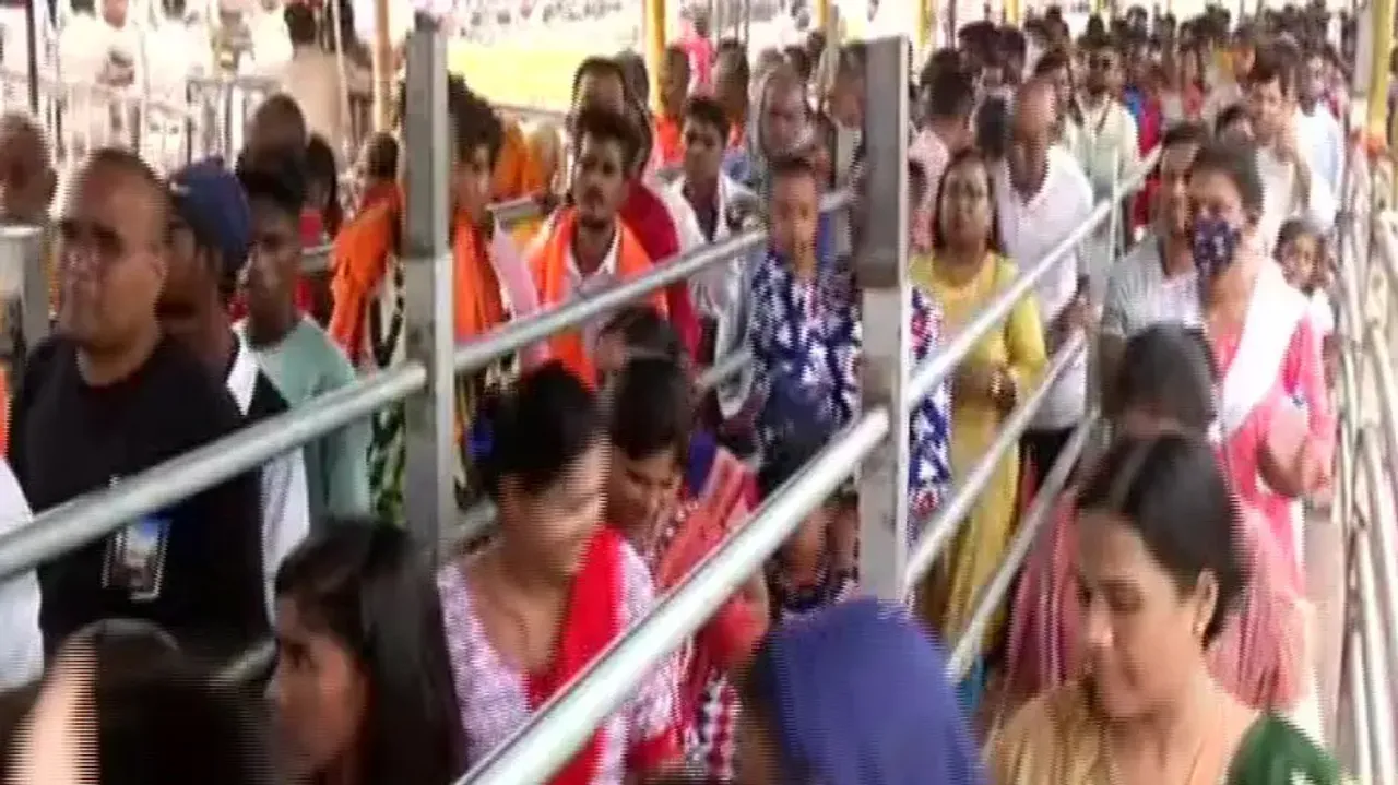 Devotees Wait In Barricades