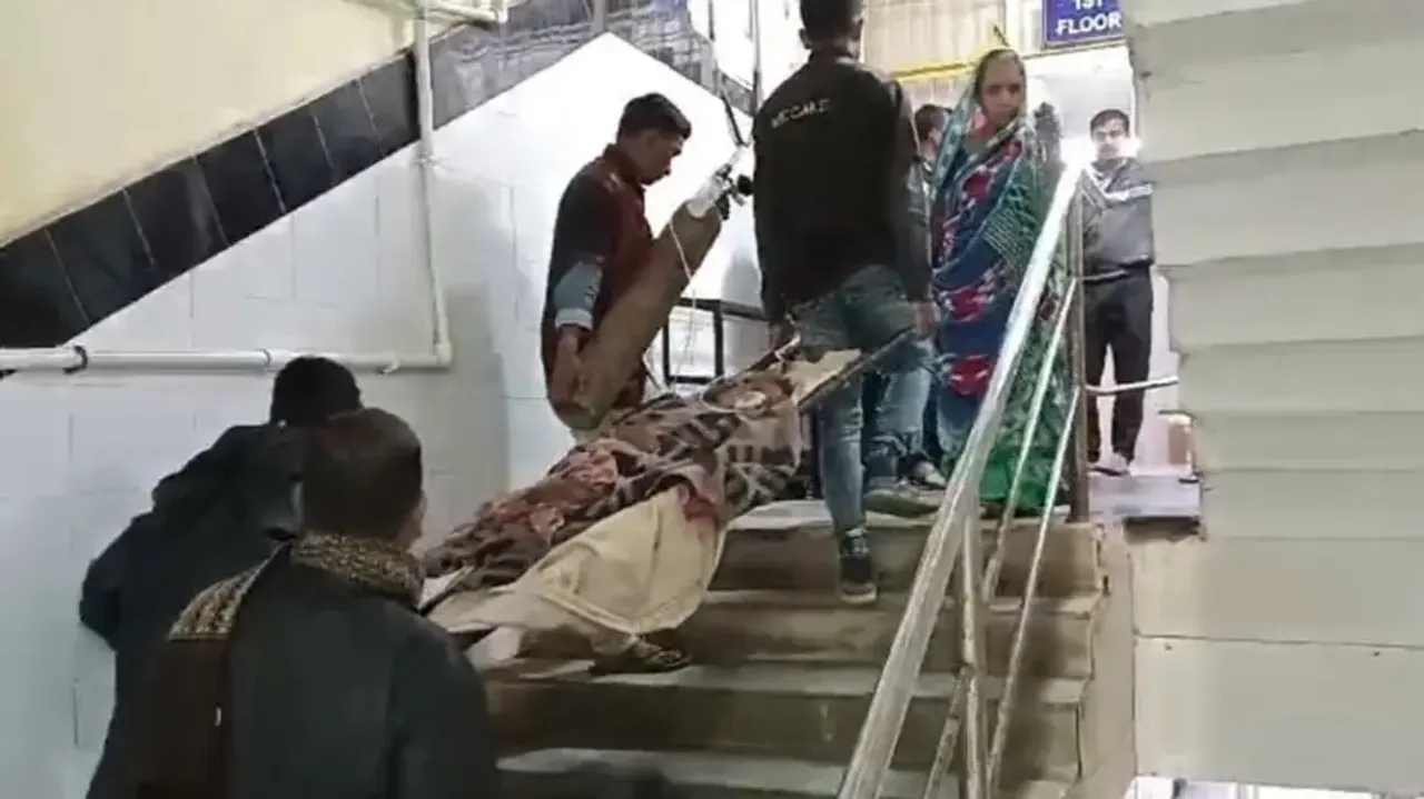 Patient On Stretcher Carried Dangerously On Stairs At SCB Hospital 
