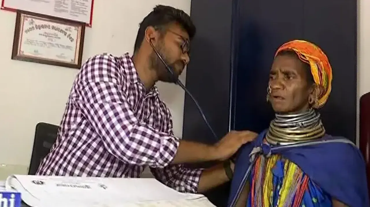 Dr Champakeshwar Treating A Bonda Woman