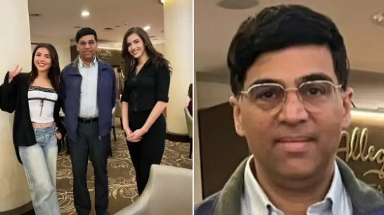 Viswanathan Anand’s hilarious expression while posing with 2 beautiful chess players leaves internet