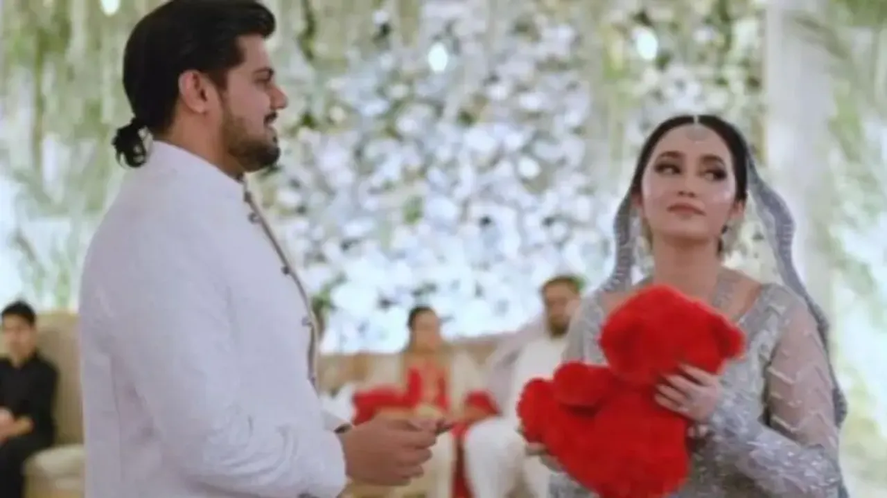 Bride and groom perform during their wedding