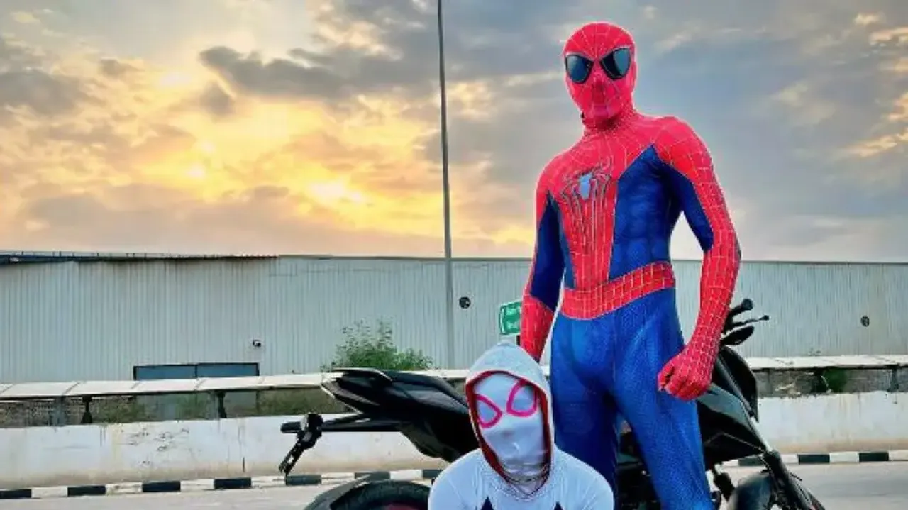 ‘Spiderman’ arrested with girlfriend  for riding bike without helmet - Watch