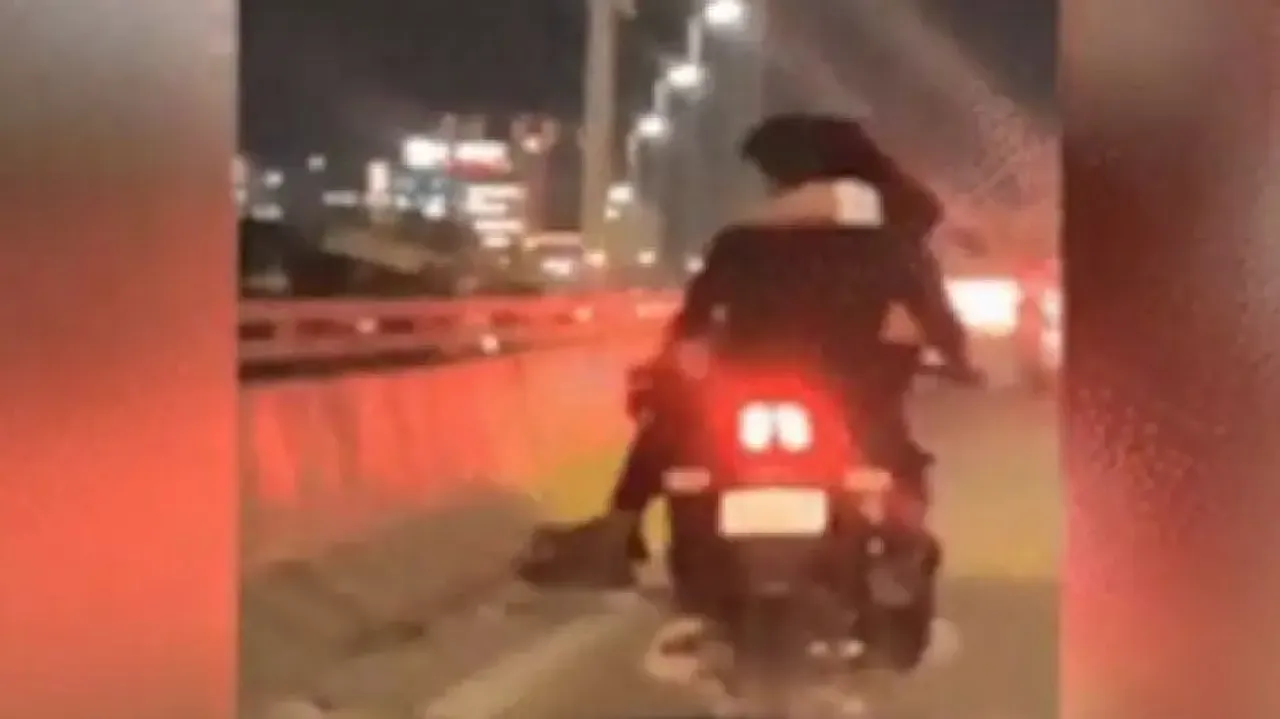 Bengaluru man rides bike with girlfriend sitting on his lap, video sparks outrage