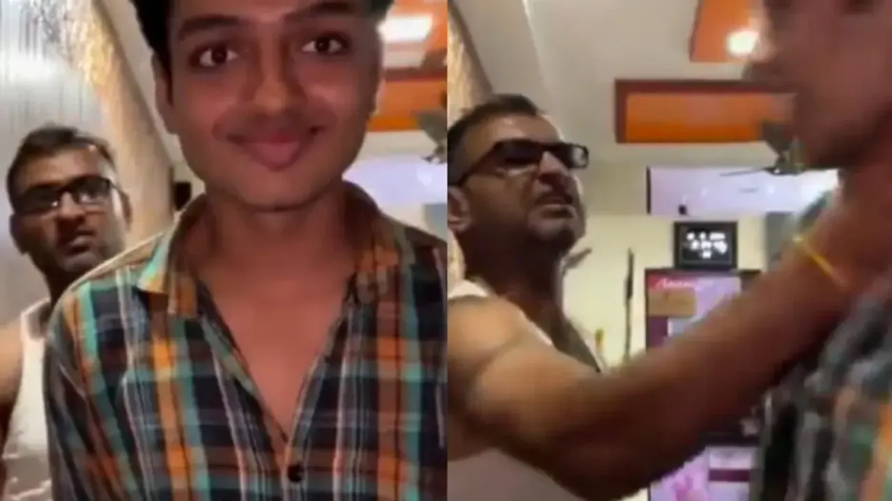 Father slapping son