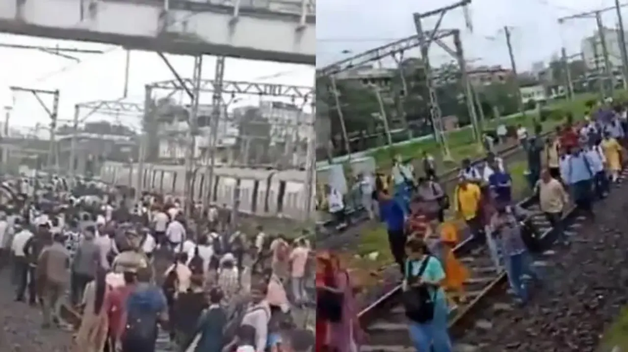 Vivek Agnihotri shares video of Mumbaikars walking on railway tracks after local trains get delayed