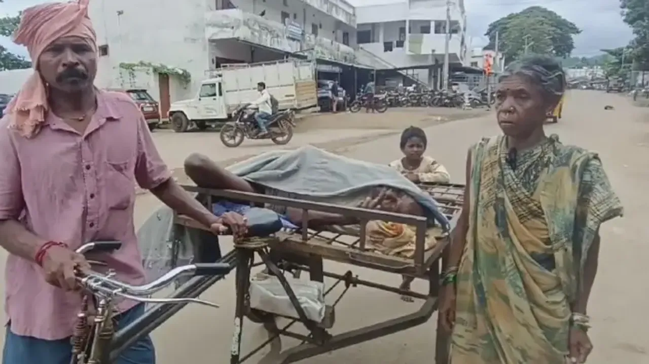 Elderly woman carries paralysed husband on trolley to get ration 