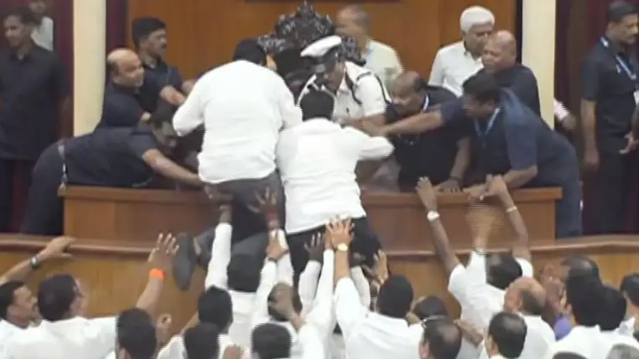 BJD MLAs climbing on to Speaker's Podium