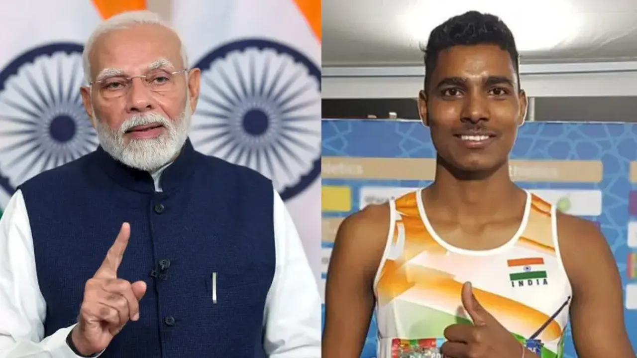 PM Modi with Paralympic athlete Nishad Kumar