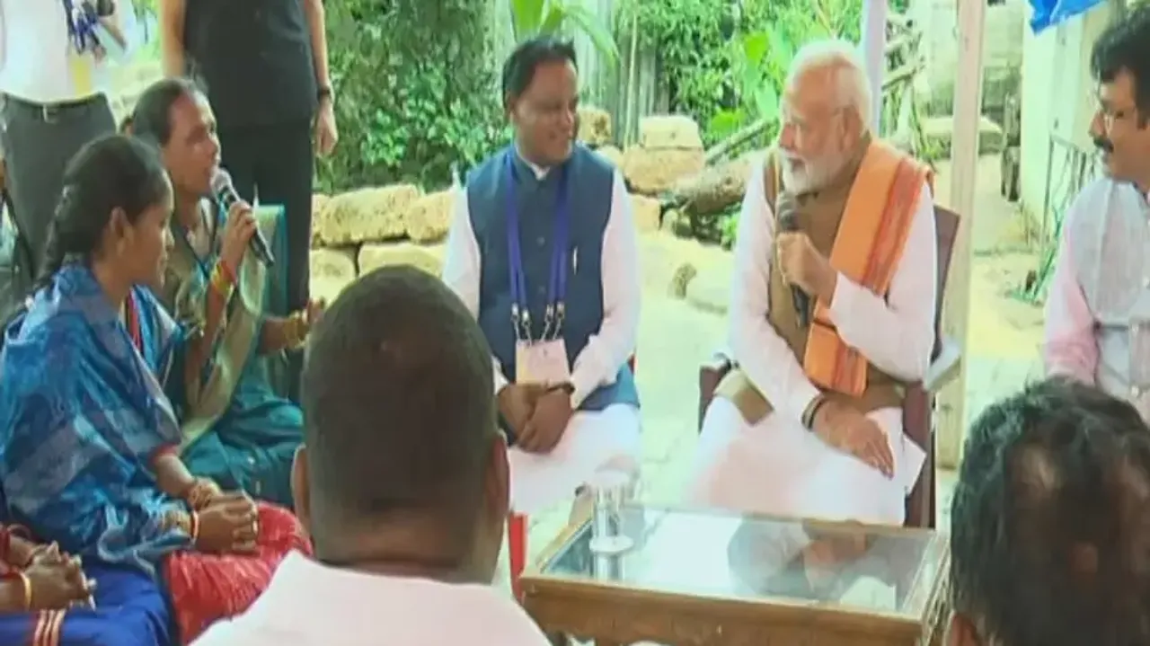 PM Narendra Modi interacts with PM Awas beneficiaries in Bhubaneswar