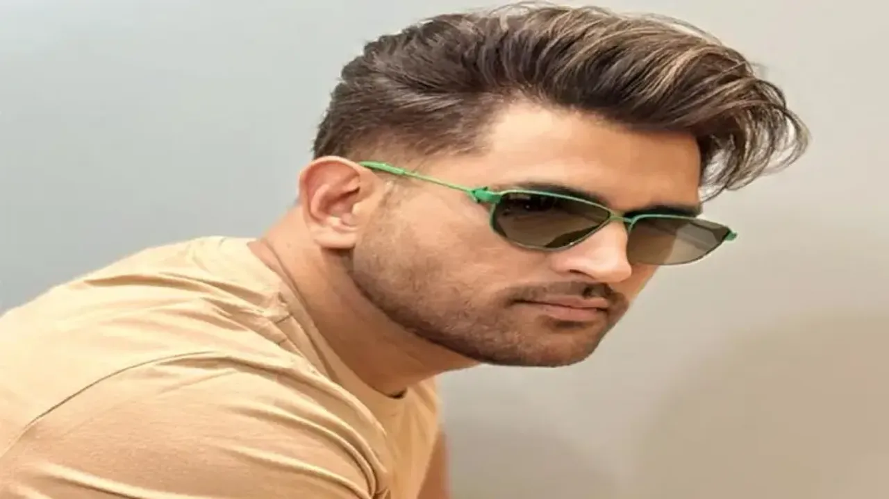 MS Dhoni with his new hairstyle