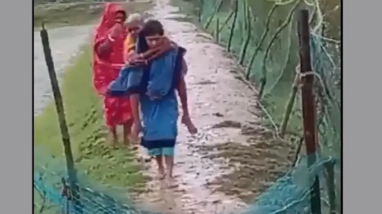 Cyclone Dana: ASHA Worker Carries Elderly Woman On Shoulder