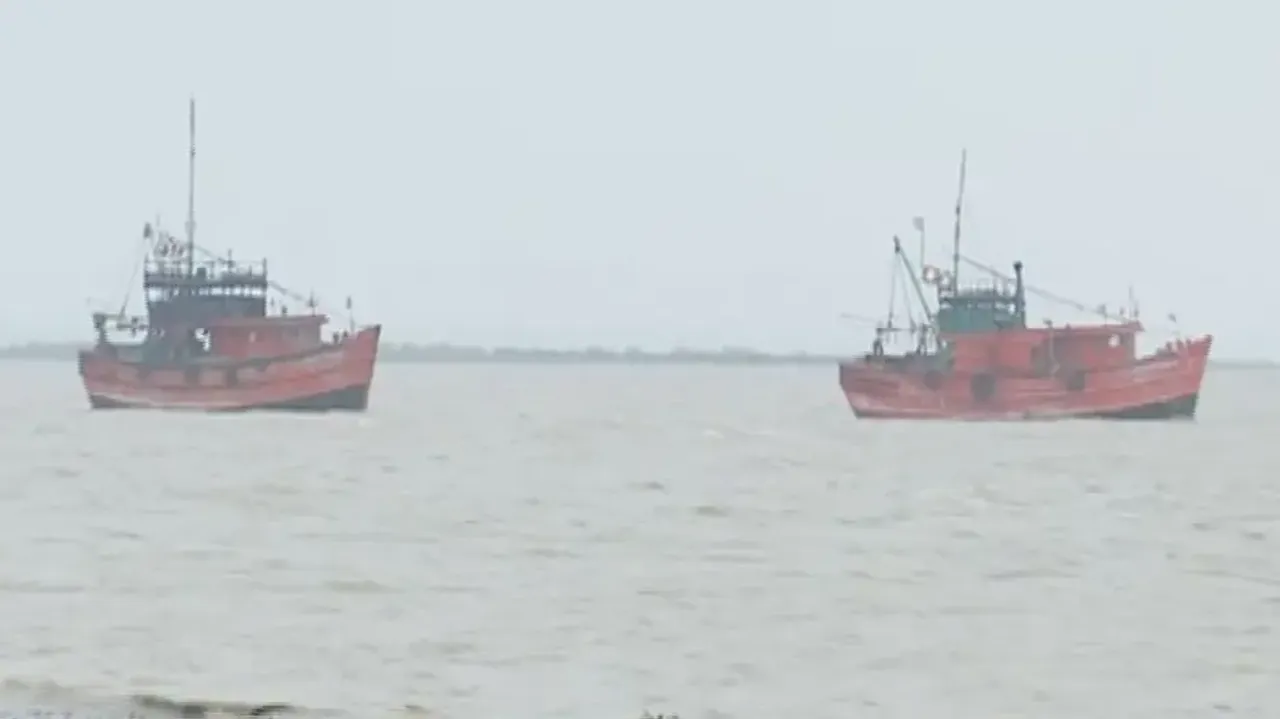 Two fishing trawlers stranded in turbulent sea near Dhamra shore
