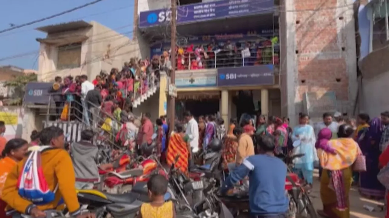 Huge rush of Subhadra Yojana beneficiaries  witnessed outside bank in Gajapati