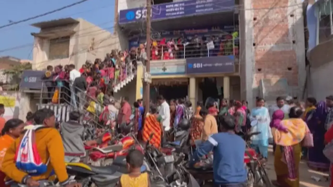 Huge rush of Subhadra Yojana beneficiaries  witnessed outside bank in Gajapati
