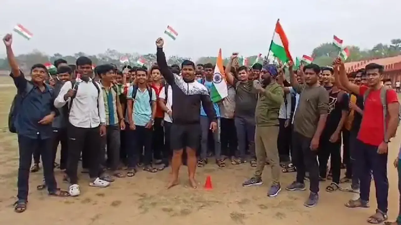 Fans cheer for team India in Odisha