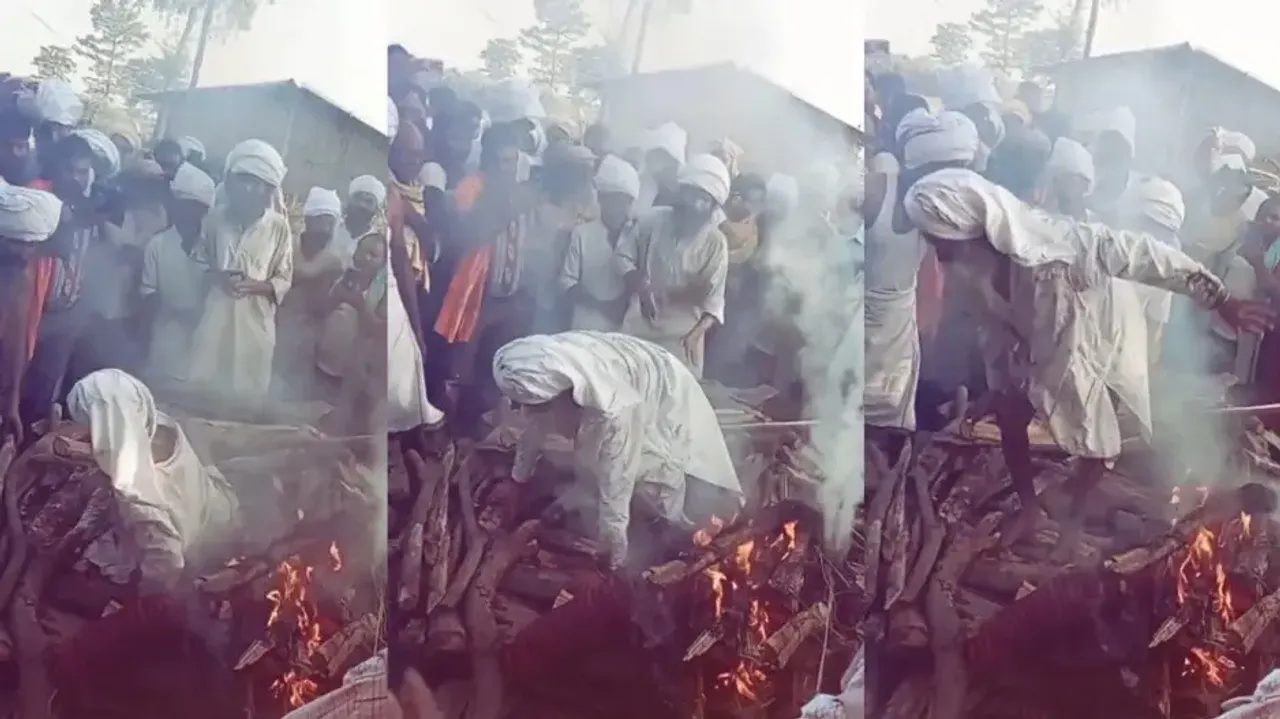 Elderly man jumps out of burning pyre watch