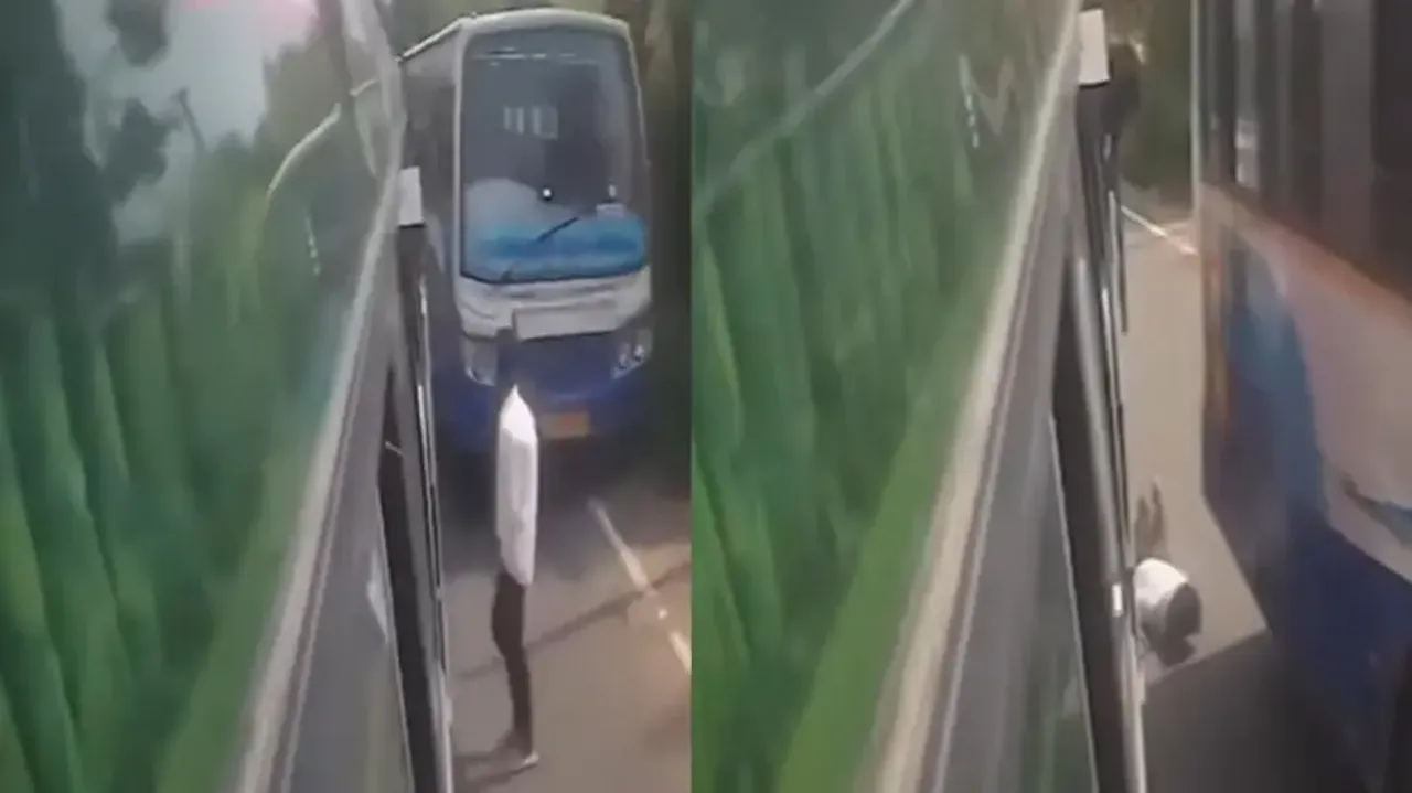 Yamraj on leave Man escapes certain death after getting pinned between 2 buses watch