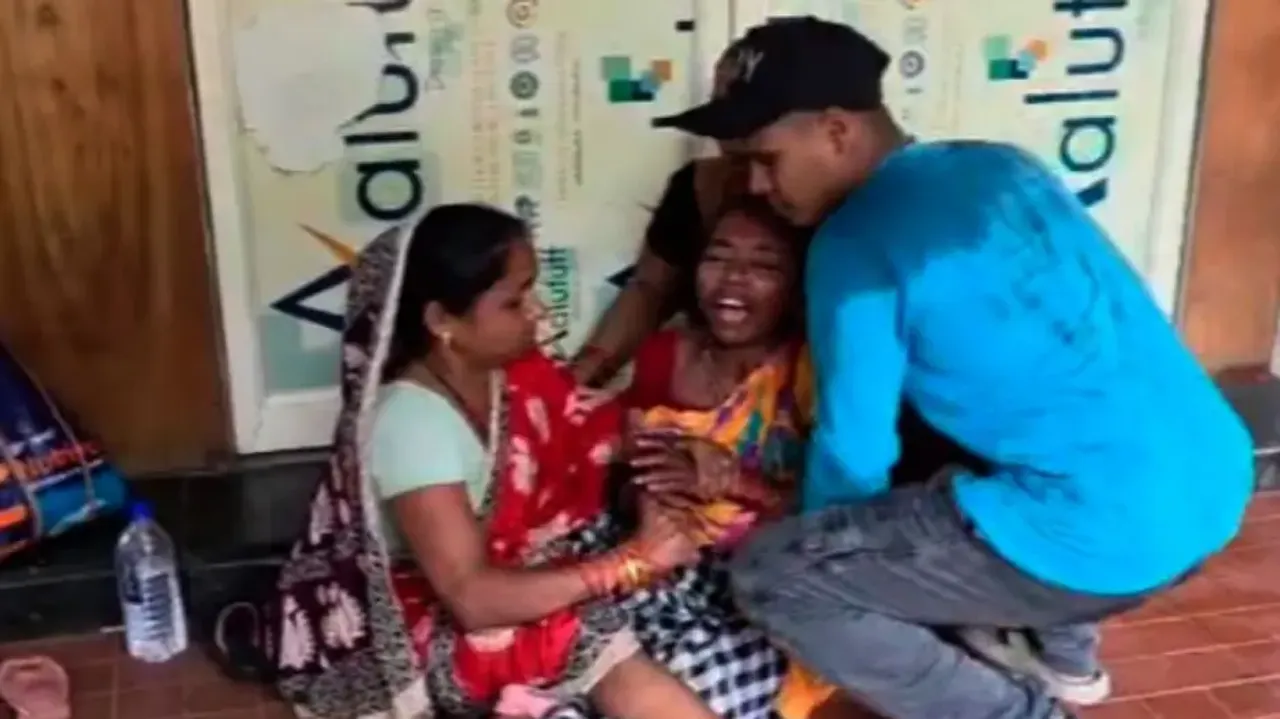 Woman breaks down after son's death