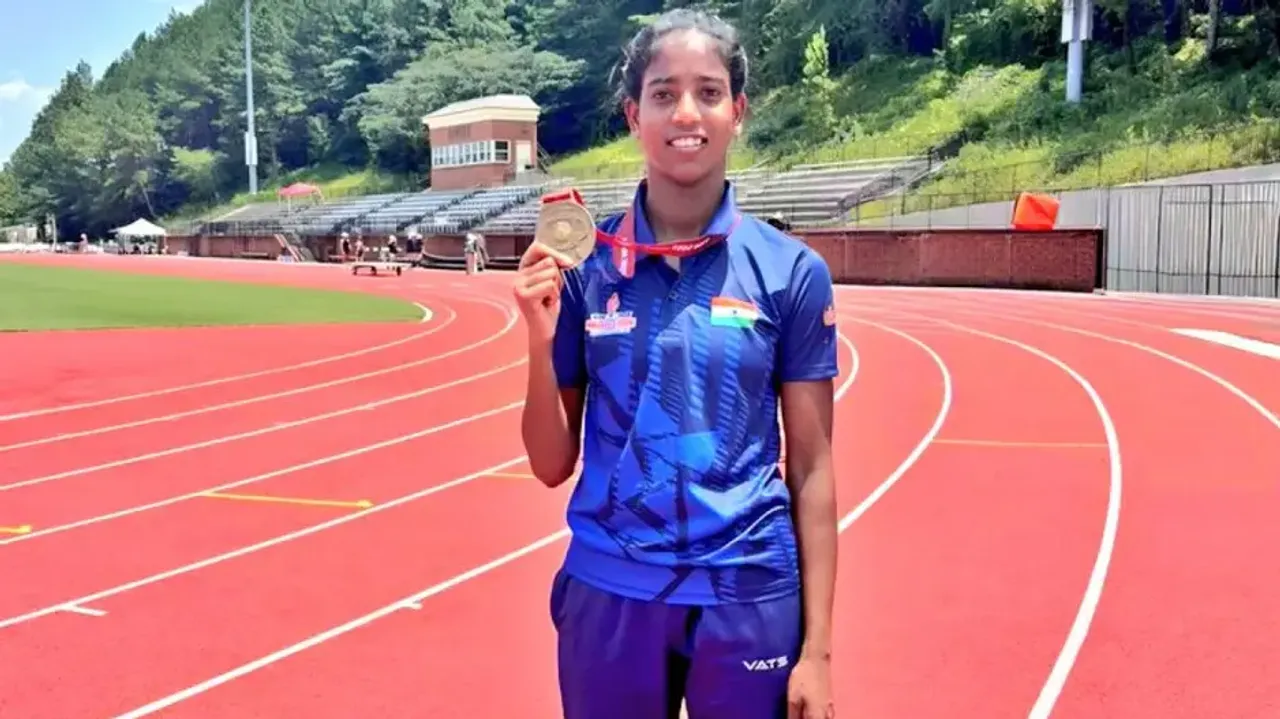 Sabita Toppo poses with her medal