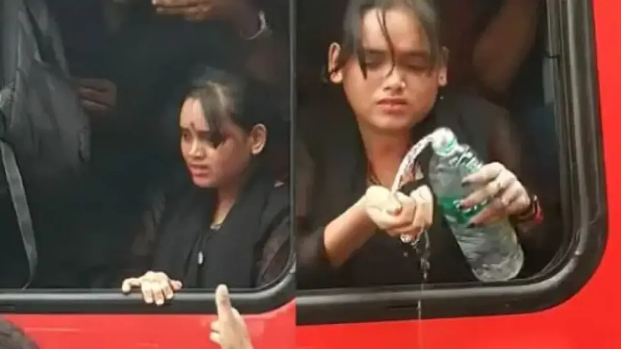 Woman struggles for air in overcrowded train but onlookers record her plight