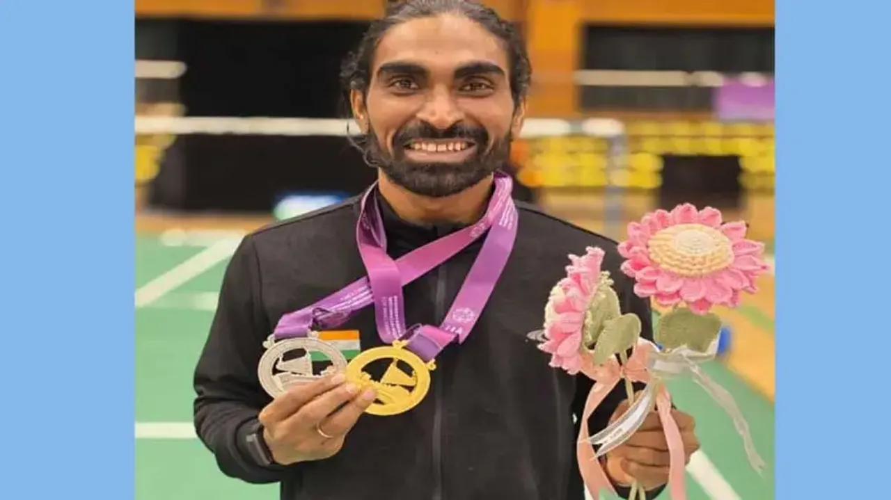 Pramod Bhagat poses with his medals