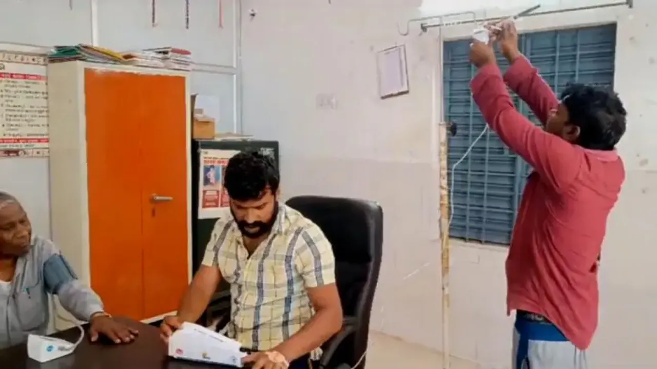 Unwell doctor on saline drip checks patients in Odisha hospital