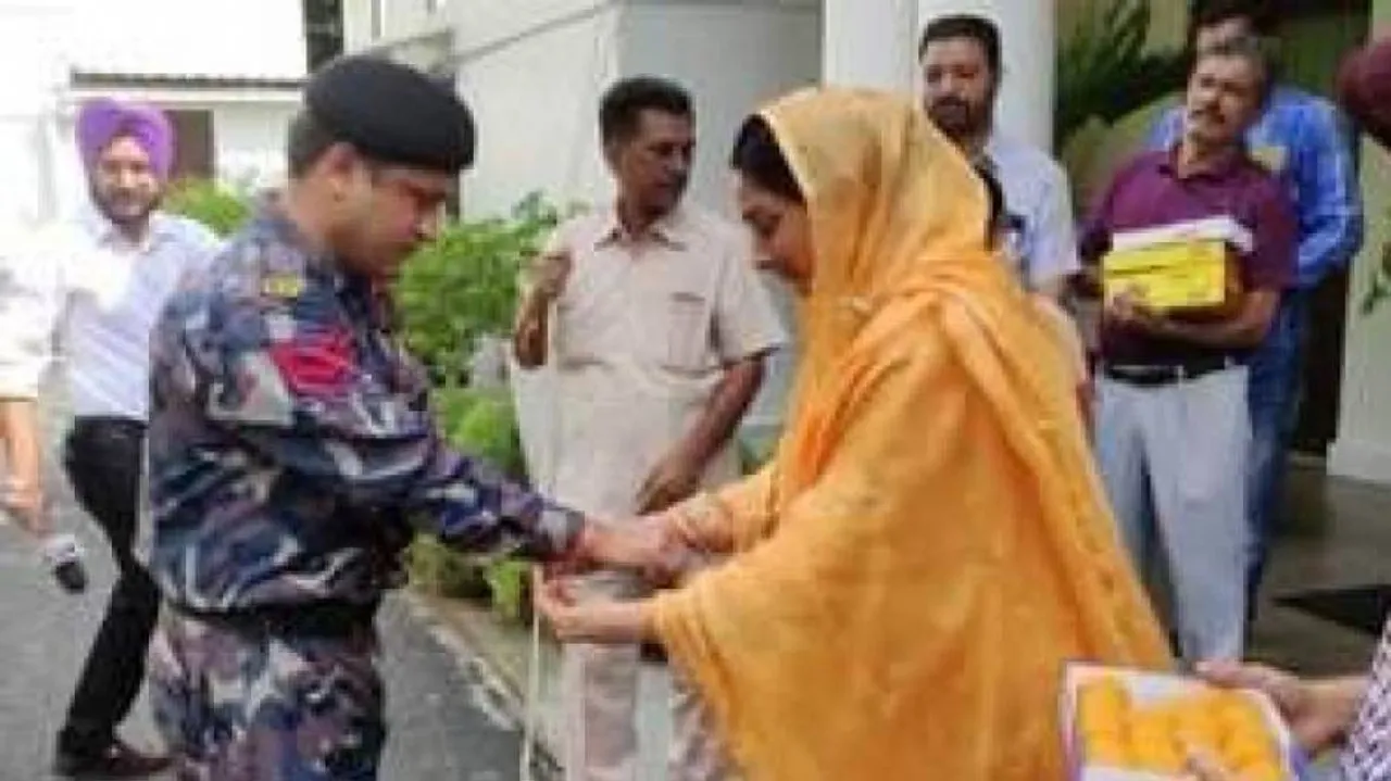 Union Minister Harsimrat Badal ties rakhis to CISF jawans