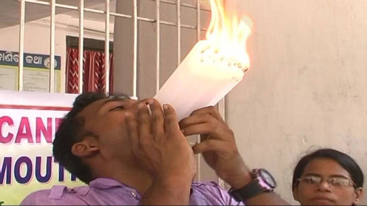 Ganjam youth eyes Guinness record with most lit candles, grapes in mouth