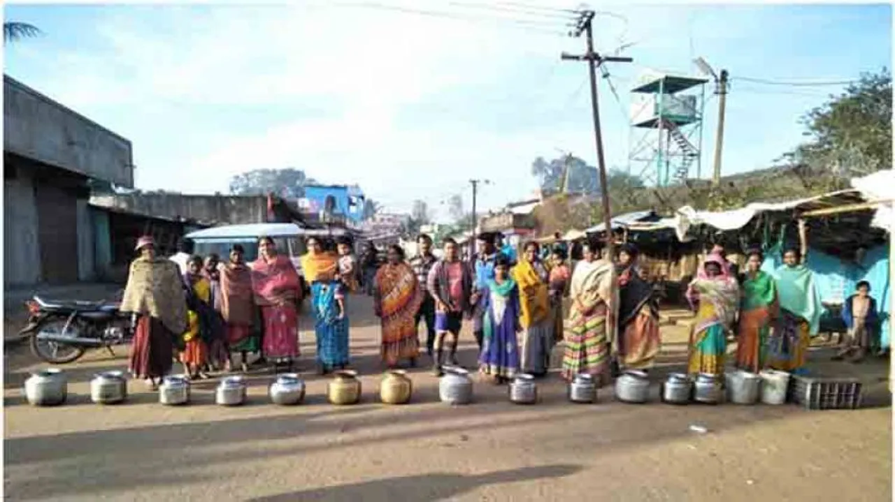 Locals block road with empty vessels in Koraput