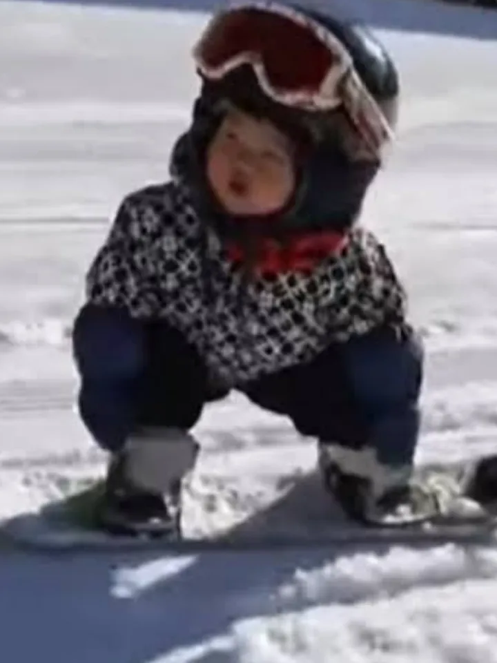 OMG 11 Months old kid does Snowboarding , See how does she executes this miracle :
