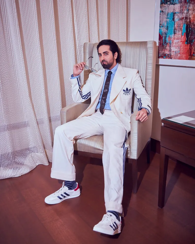 Ayushmann Khurrana looked dapper in a Gucci X Adidas suit at the evening soiree with Anna Wintour last evening in Mumbai