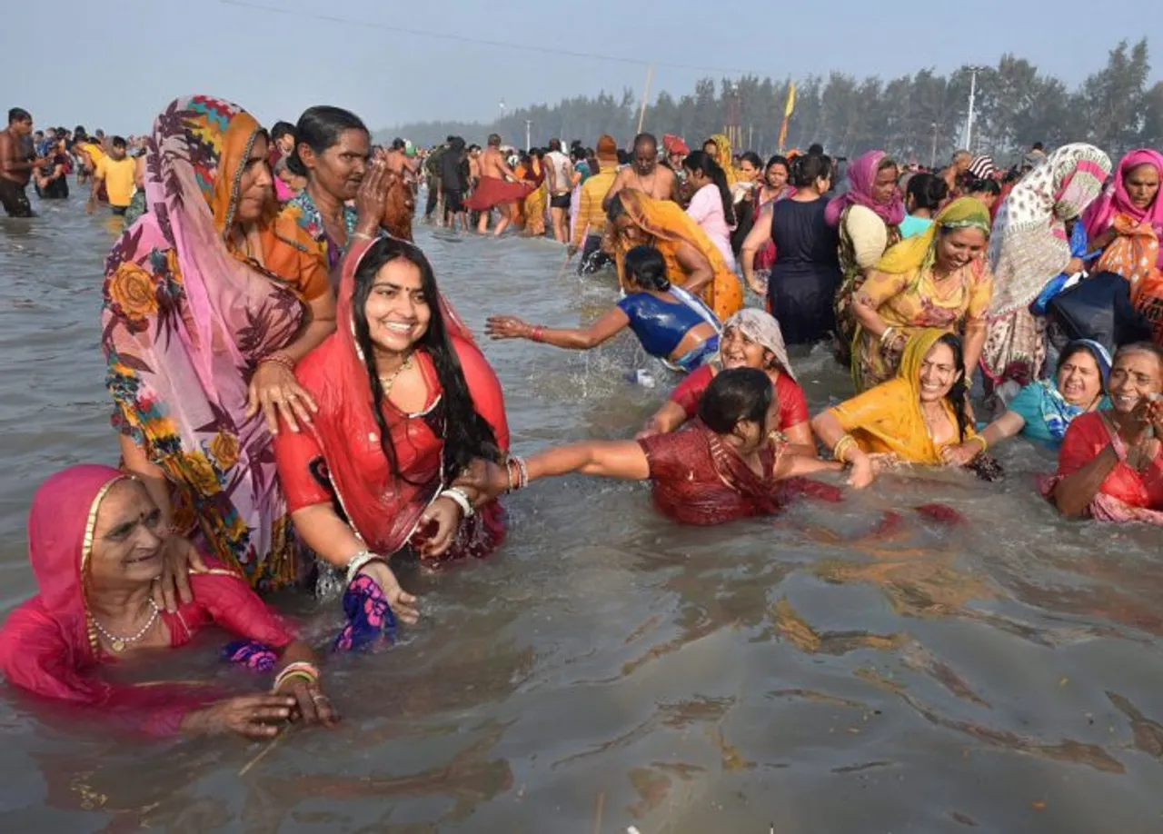 Devotees Take Holy Dip In Ganga On Makar Sankranti
