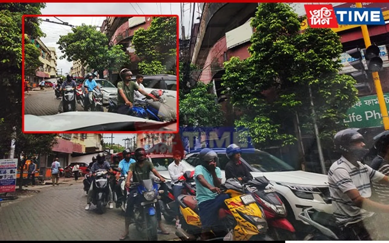 Guwahati Bikers Lane-Splitting at Ulubari Traffic Stop: A Risky Maneuver That Needs Attention