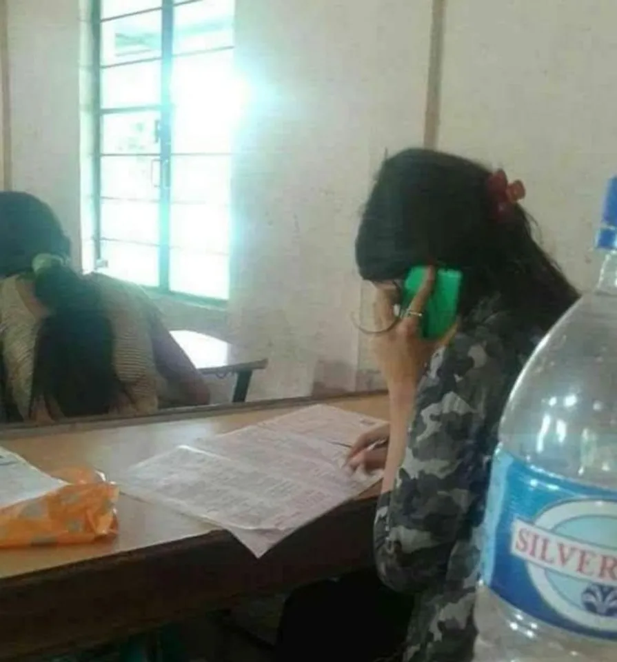 Assam PNRD question paper leaked | Candidates use mobile phones during exam