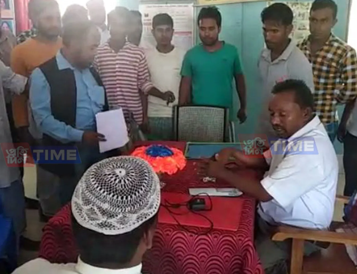 Caught red-handed! Headmaster takes bribe on NRC