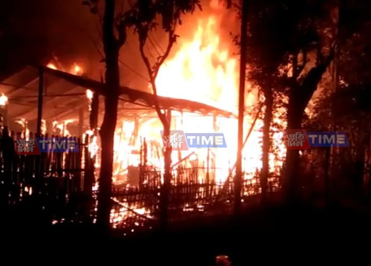 Massive fire guts two houses at Mariani