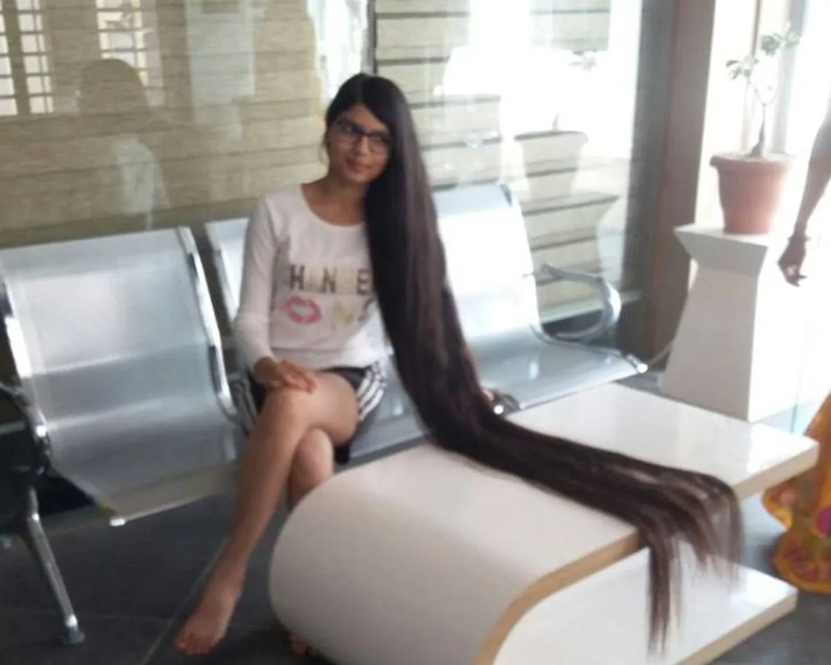 Indian teen’s long hair sets Guinness record