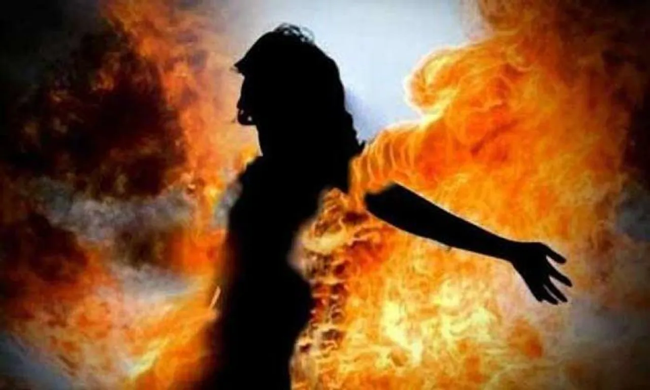 Woman set on fire by in-laws, husband