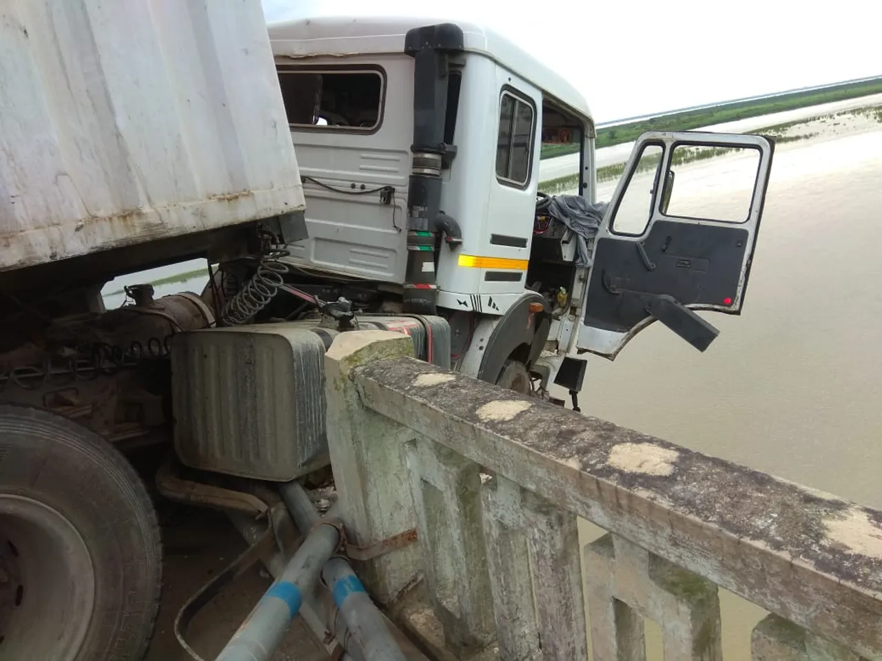 Vehicle carrying trailer turns turtle in Tezpur