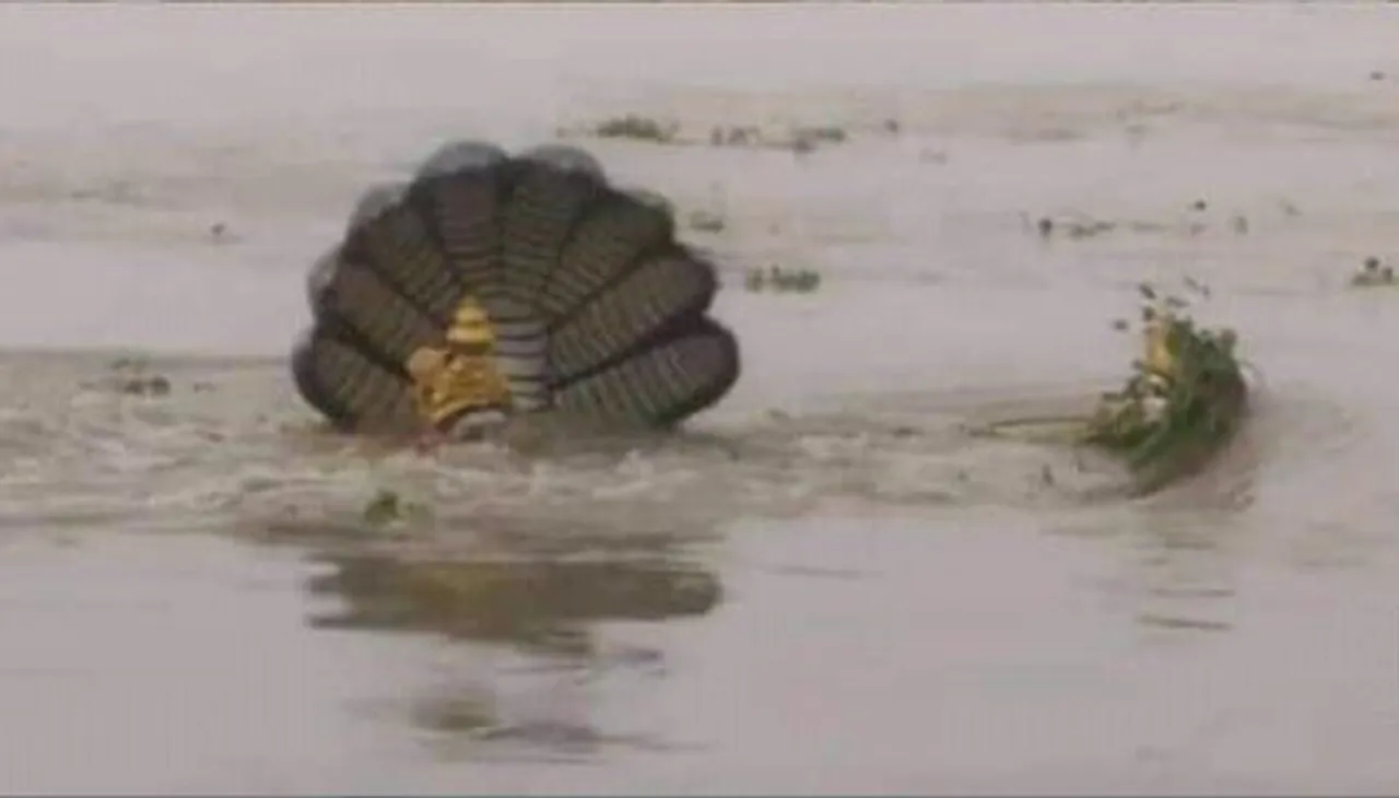 Deity survives as flood rages