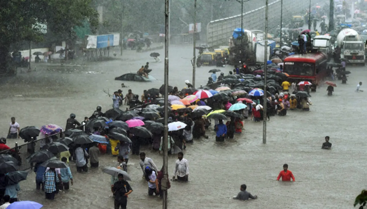 Rains paralyse Mumbai, train, flight services hit
