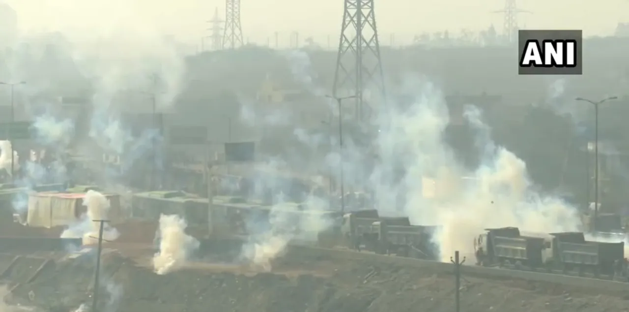 Tear Gas Fired At Farmers For Breaking Barricades