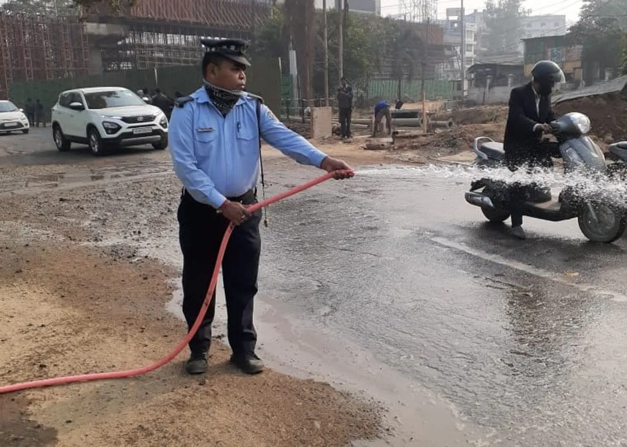 Guwahati Traffic Cop Cleans Road For Commuters, Earns Online Praise