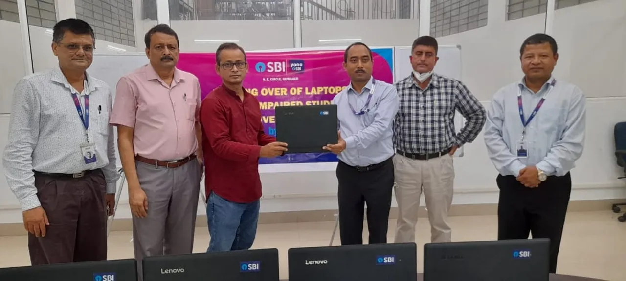 Cotton University Receive Laptops For Visually Impaired From SBI