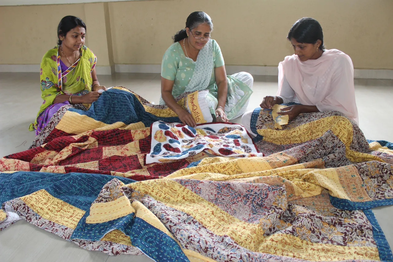 Women making godhadis