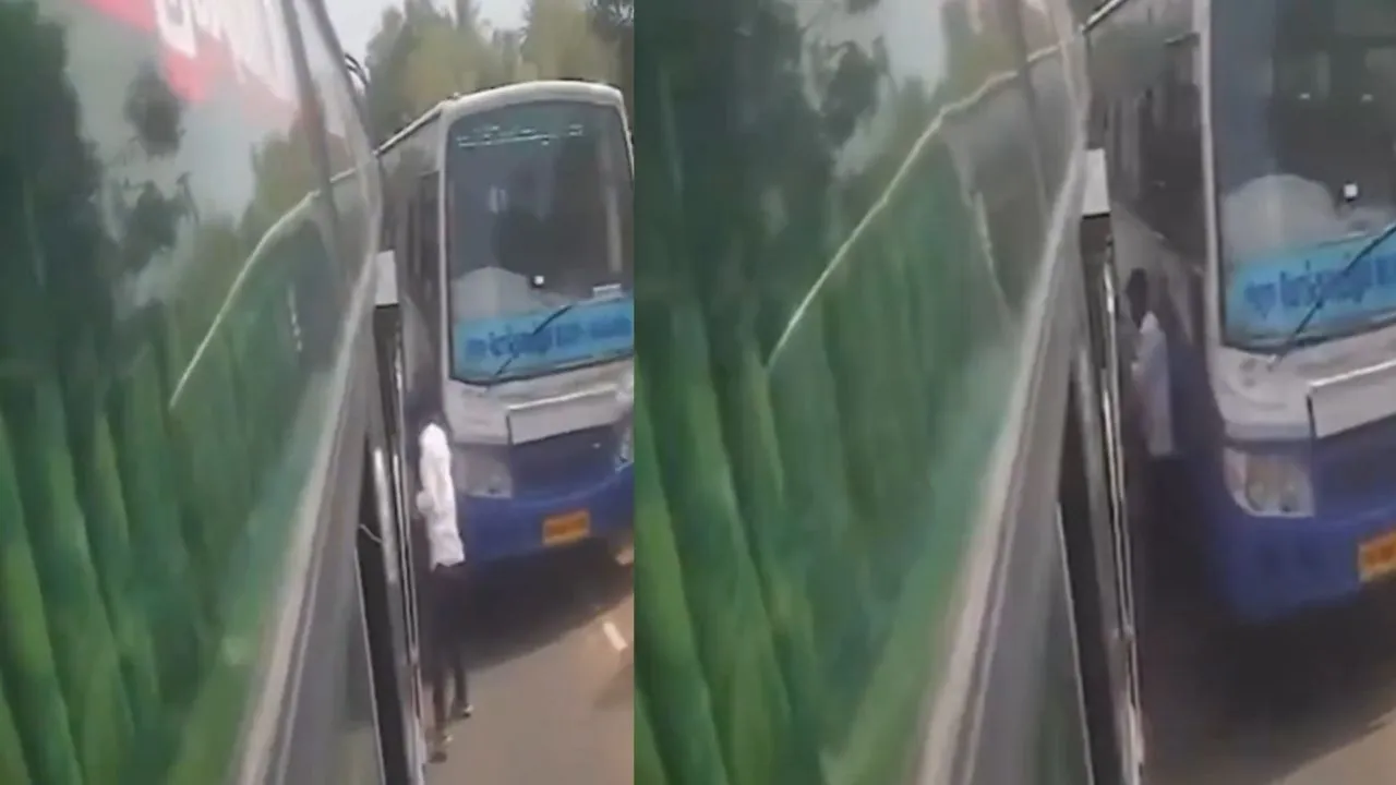 Young man trapped between two buses